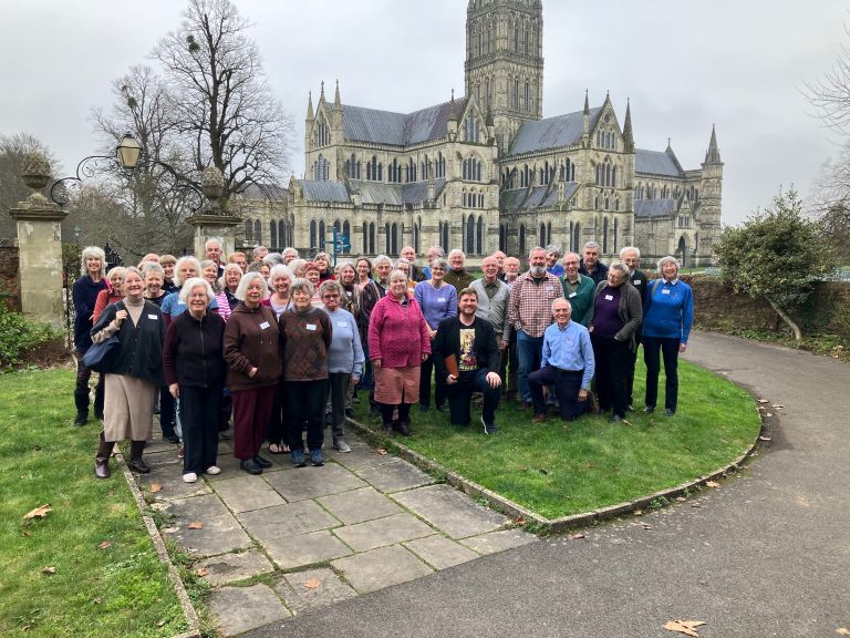 Laetare Singers with Salisbury Cathedral behind